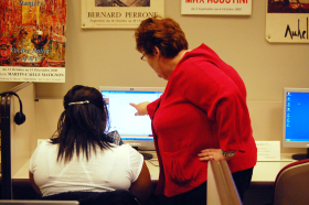 Julie Hatton helps a student in the Modern Languages Lab. The lab is located in Building 2 Room 321. --photo by Rusty Pate