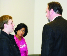 Courseview students Paul Herenrother and Sona Gibson talk to Sinclair President Steven Johnson on Feb. 16. --photo by Rusty Pate