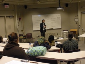 Hip-hop aficionado, Danny Rodriguez discusses the definition of "manhood" with the audience before showing the documentary "Hip-Hop: Beyond Beats and Rhymes."