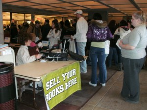 Sinclair students fill up the lobby in Building 7 while waiting to get into the bookstore on Jan. 4, the first day of winter quarter.