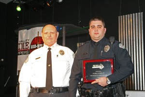 Nicholas Toscani (right) stands with Police Chief Charles Gift at the Miami Valley Crime Stoppers awards.
