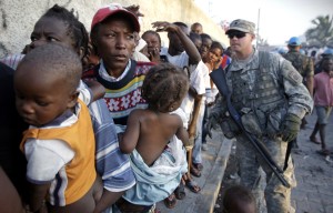 The Brazilian Battalion and and the U.S. Army joined forces for a food distribution in Cite Soleil, Haiti, Sunday, January 24, 2010.