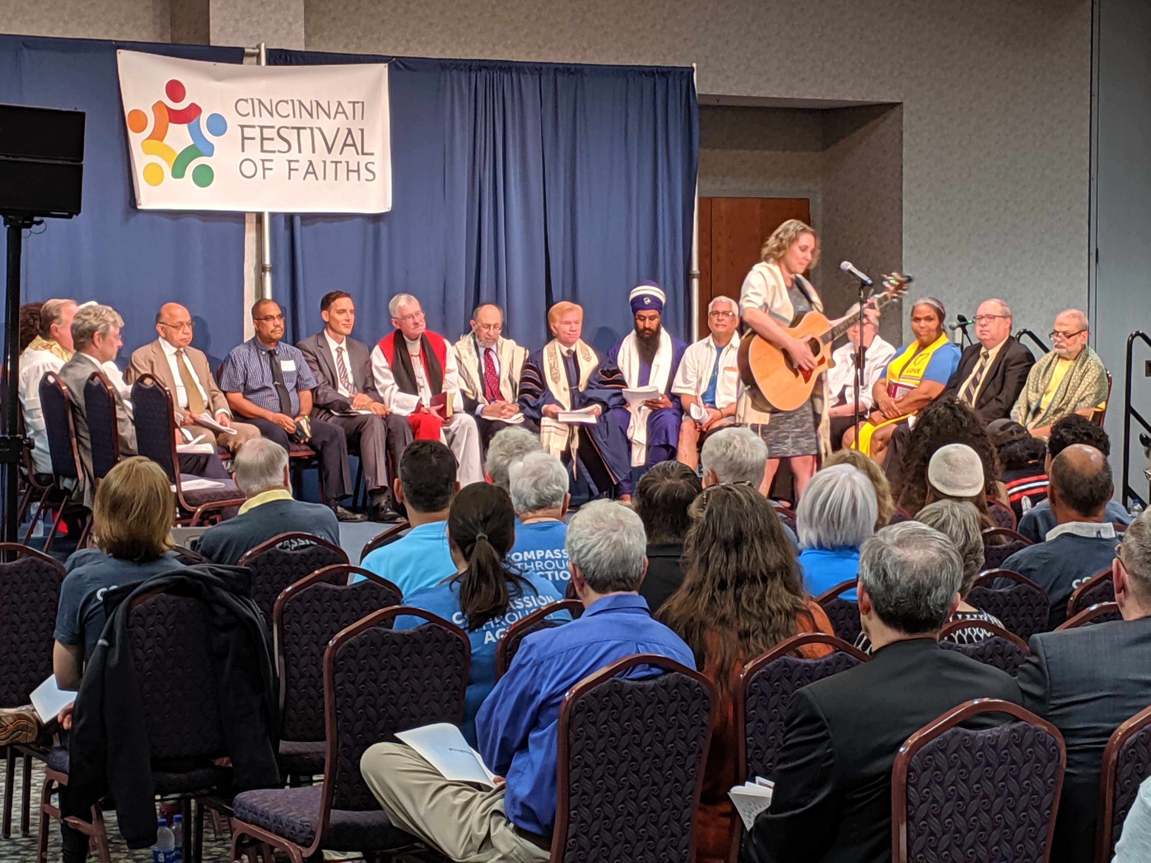 Women playing guitar at Cincinnati Festival of Faiths